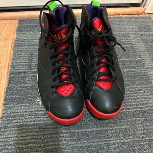 fairly worn multi color black with red shoes